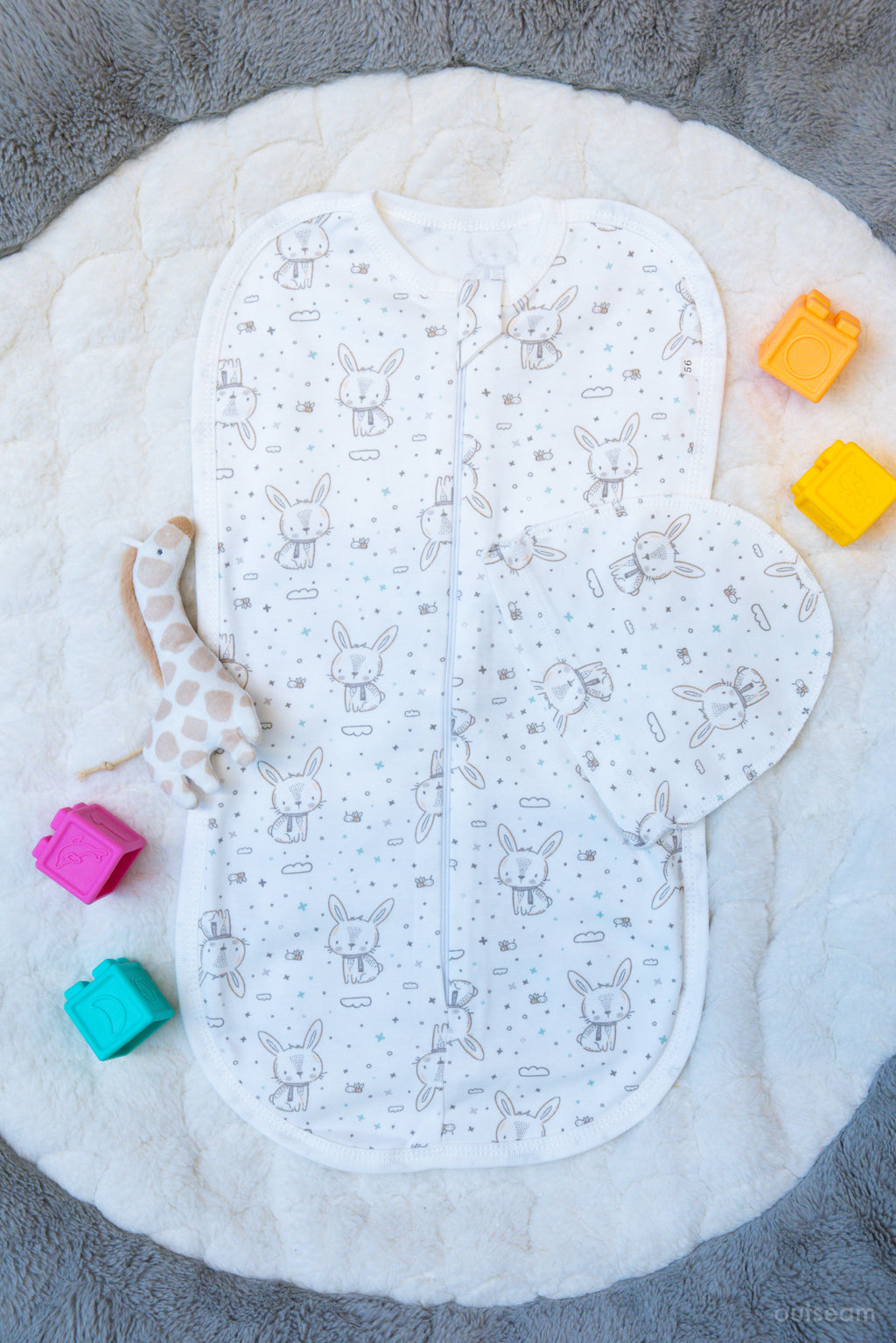 Outseam Newborn Sleep Cocoon - Rabbit — soft cotton baby sleep cocoon with outward seams